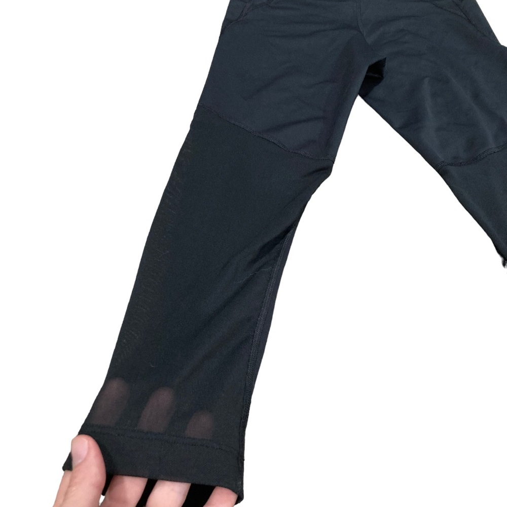 Nike DRI-FIT small cropped leggings with sheer, mesh lower back. - Picture 3 of 5